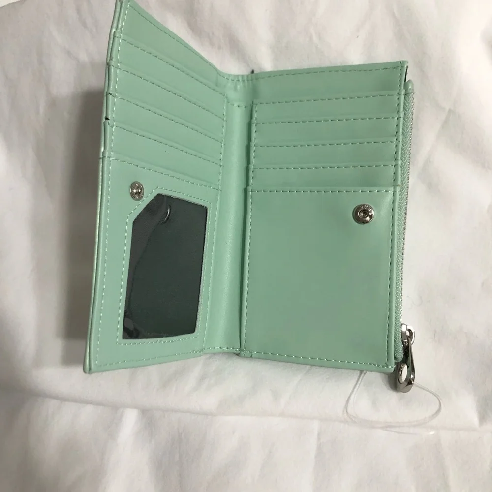 Snap Wallet zip pocket 8 slots 1 id slot 3 bill pockets mint green. 6”L X 4” W